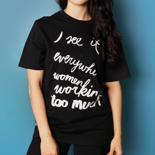 Eva Vēvere. Unisex T-Shirt "I see it everywhere women working too much"