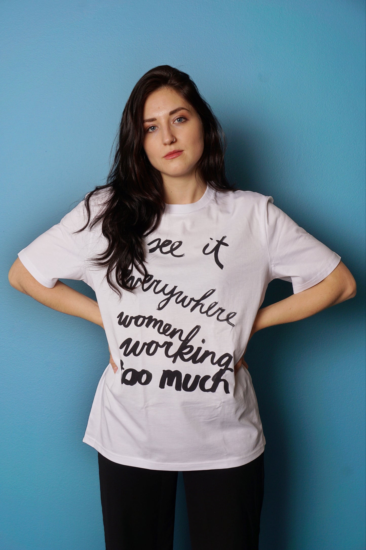 Eva Vēvere. Unisex T-Shirt "I see it everywhere women working too much"