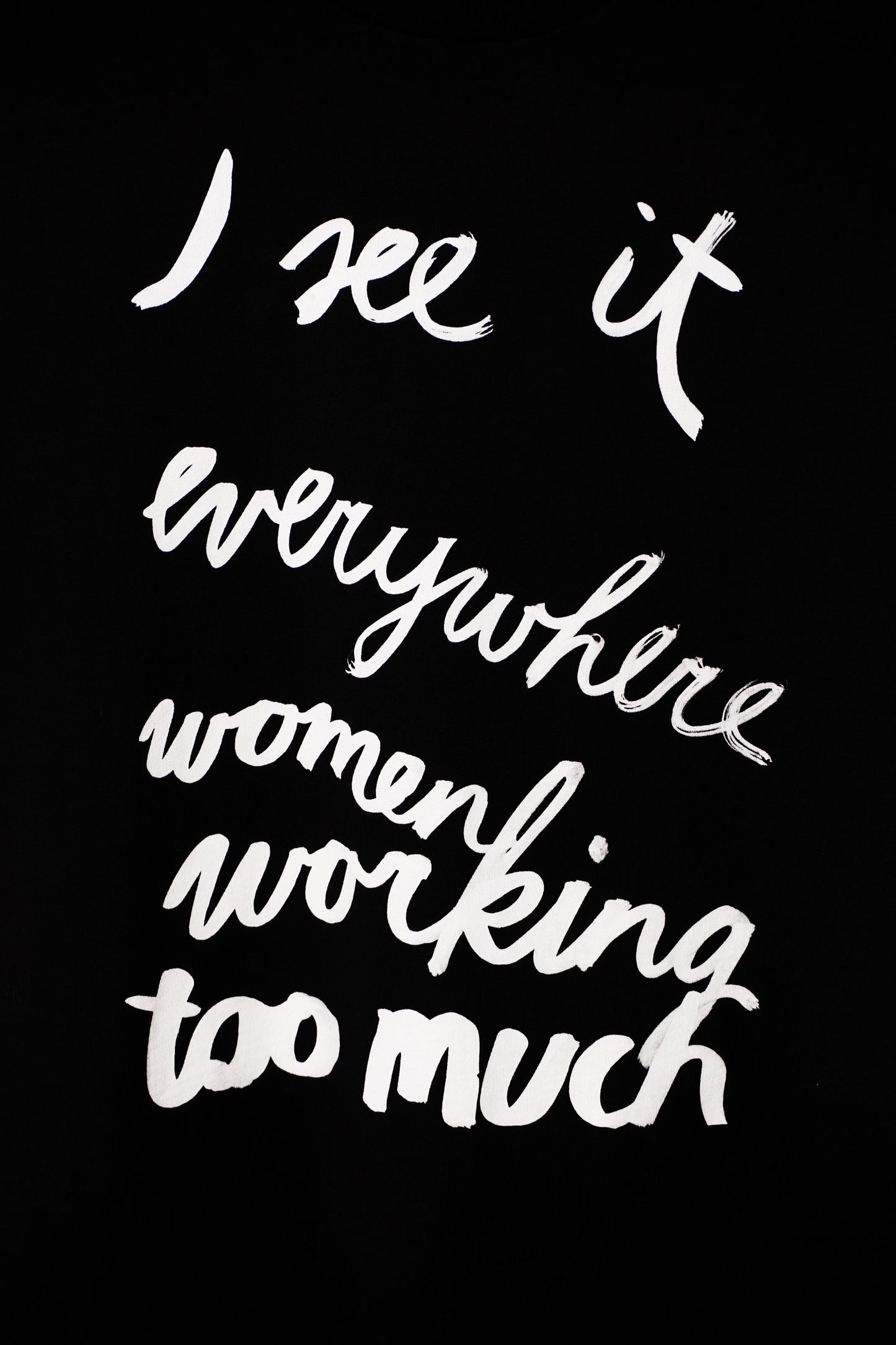 Eva Vēvere. Unisex T-Shirt "I see it everywhere women working too much"