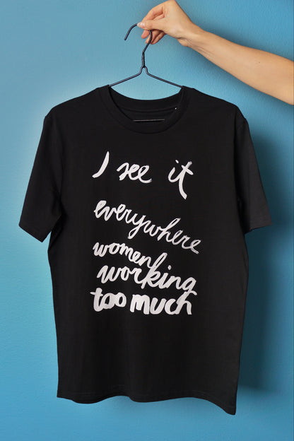 Eva Vēvere. Unisex T-Shirt "I see it everywhere women working too much"
