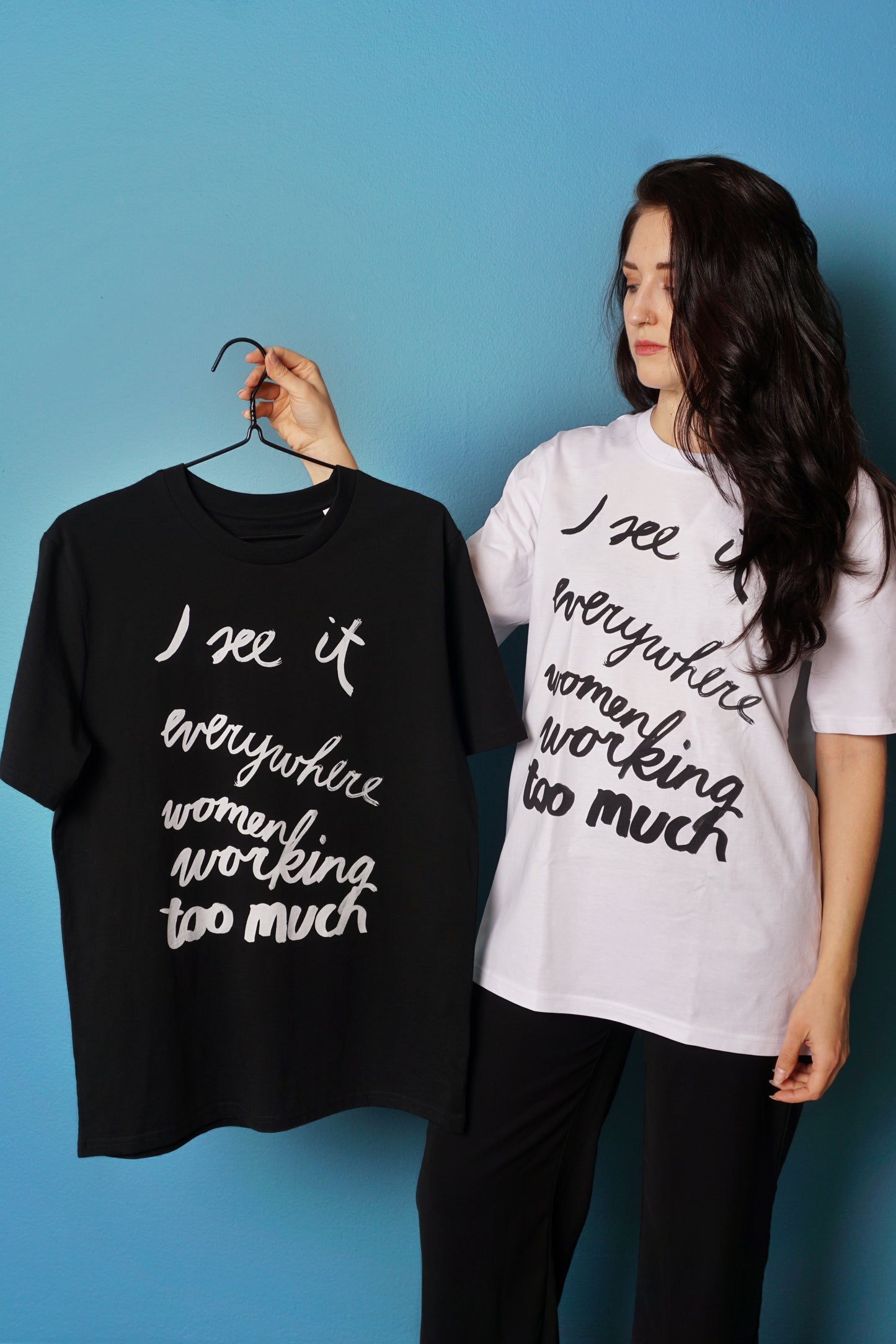 Eva Vēvere. Unisex T-Shirt "I see it everywhere women working too much"